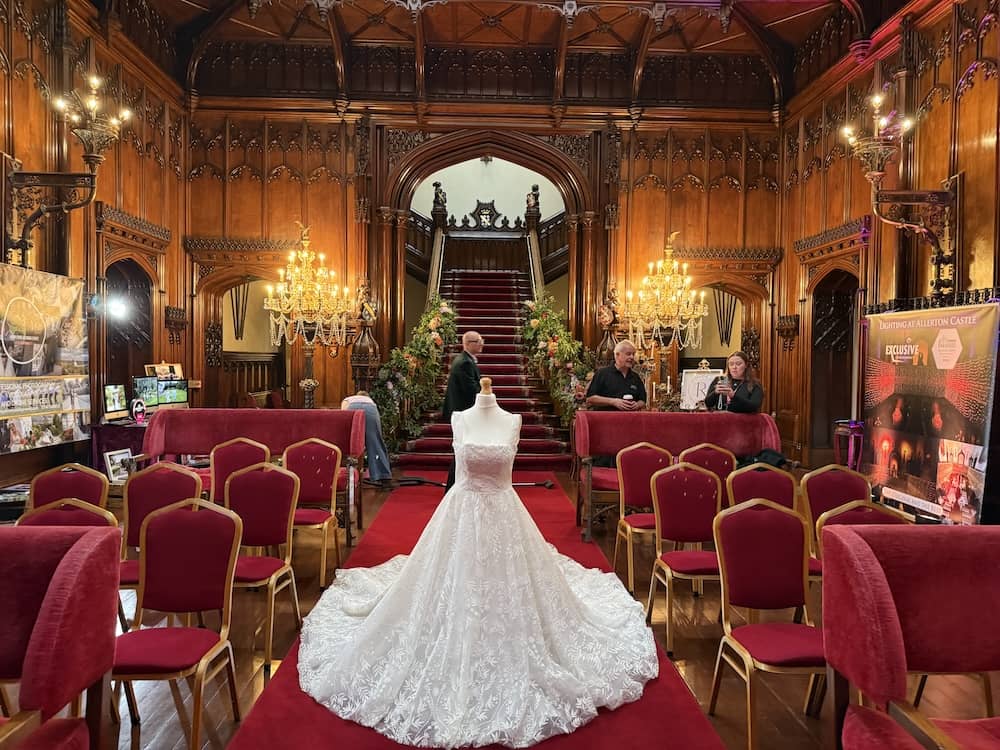 Wedding dress displayed in the Great Hall at Allerton Castle