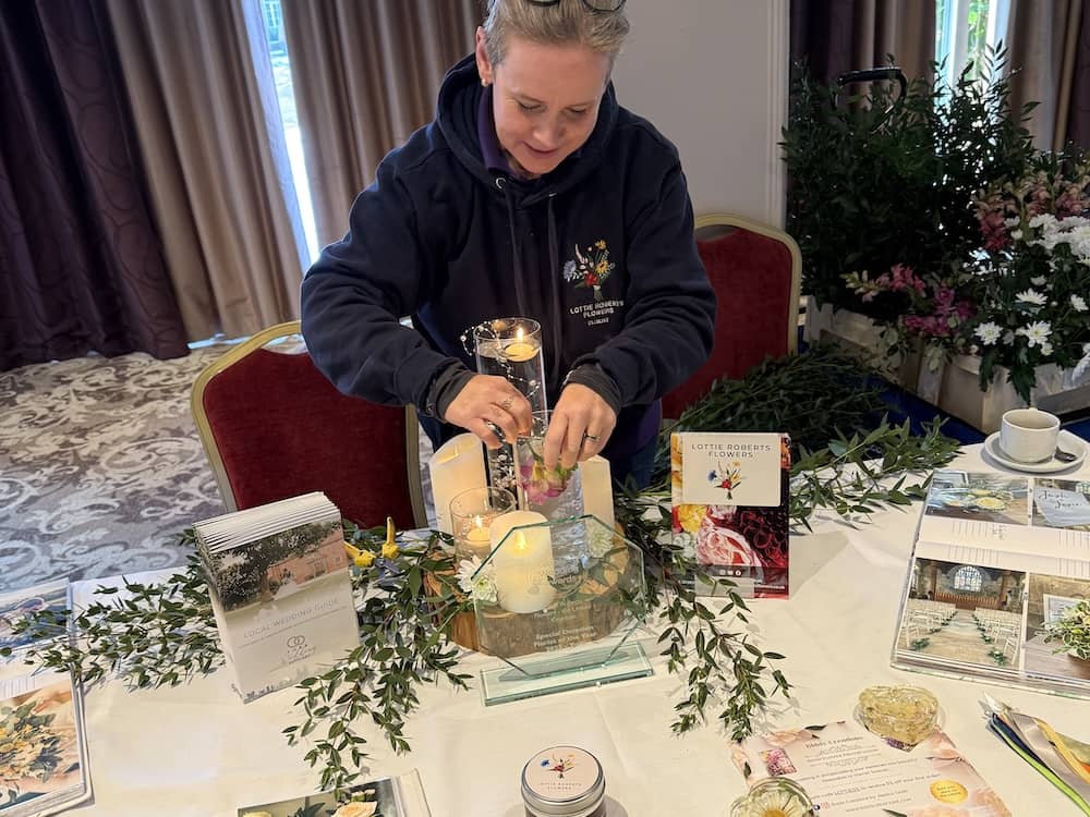 Wedding supplier preparing display at The Bridge Hotel open evening