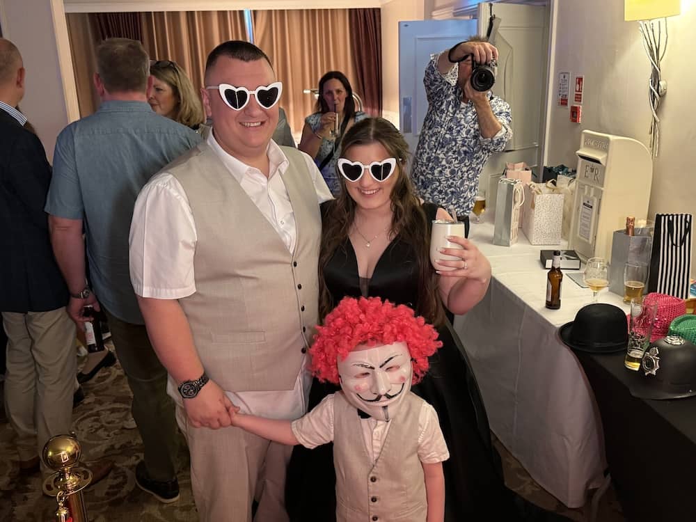 Guests using the Magic Mirror at Tyler and Josh's wedding at The Bridge Hotel and Spa