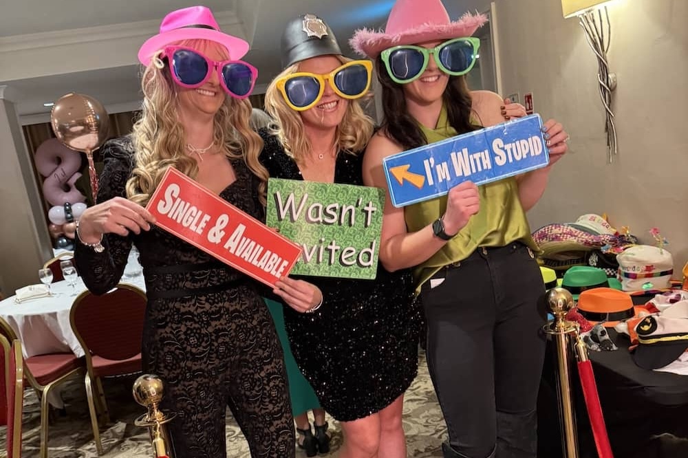 Group photo at the Magic Mirror at The Bridge Hotel & Spa wedding