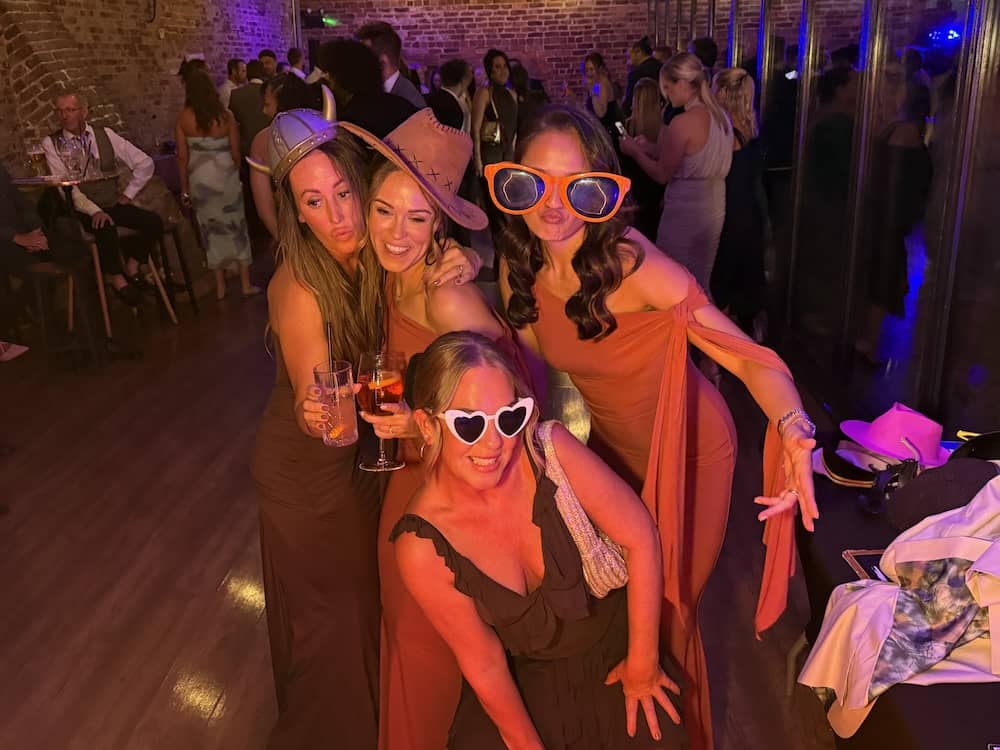 Group of wedding guests at the Magic Mirror at Camblesforth Hall