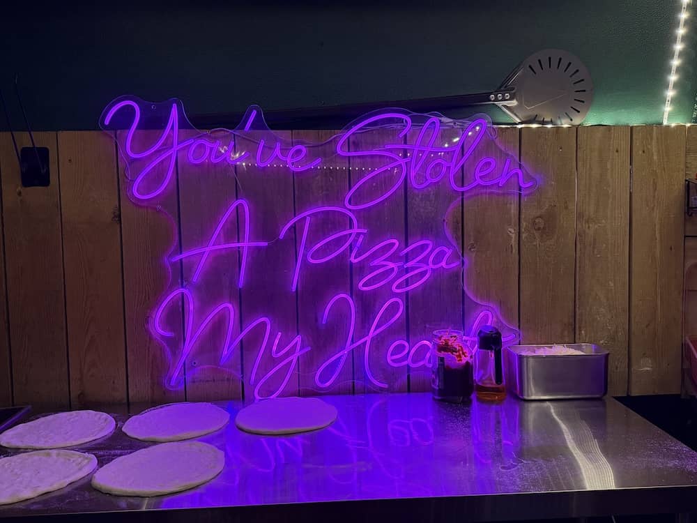 You've Stolen A Pizza My Heart neon wedding sign at Camblesforth Hall
