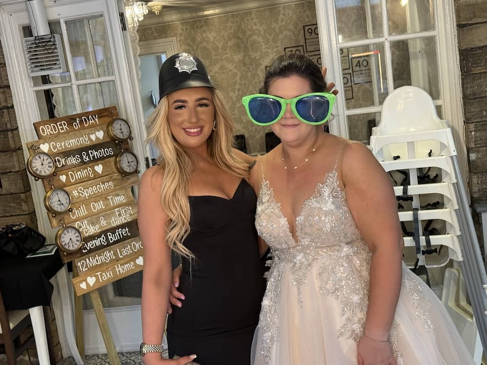 Bride Kay with wedding guests at the Magic Mirror