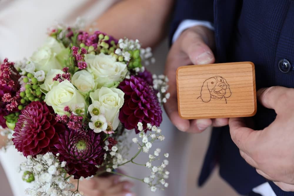 Wedding bouquet and wooden ring box at a Harrogate wedding