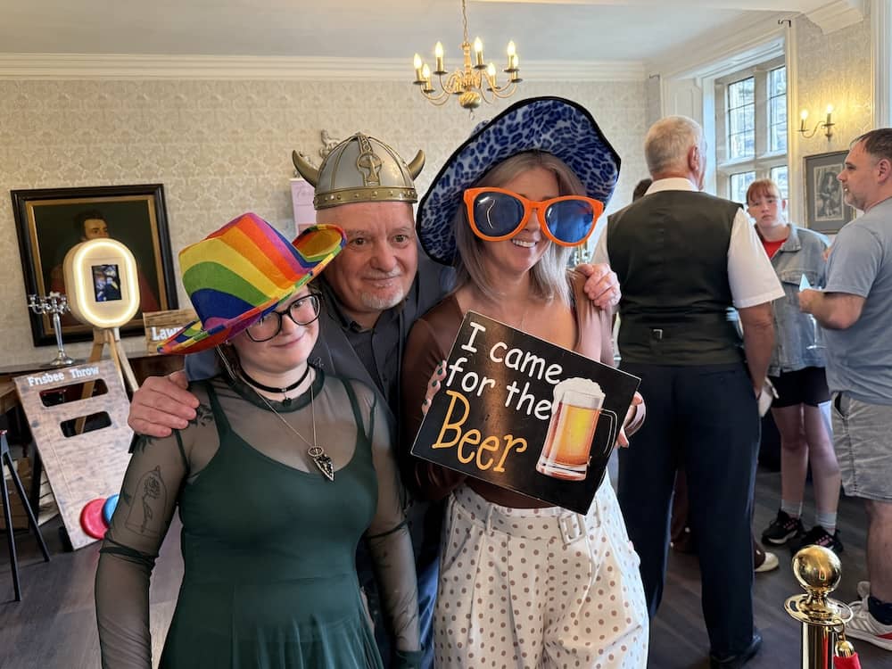 Guests having fun with the Magic Mirror at Hodroyd Hall Wedding Fayre