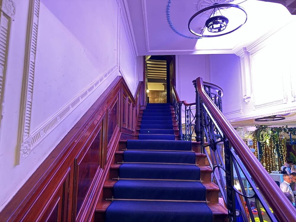 Staircase leading towards the ceremony room at Impossible York
