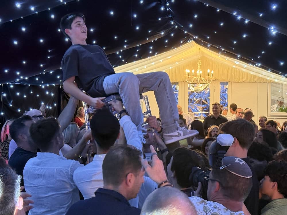 Joe being lifted on a chair during his Bar Mitzvah