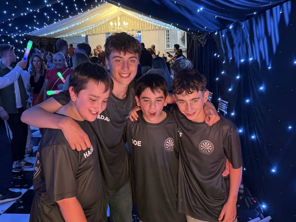 Joe and his friends using the Magic Mirror at his Bar Mitzvah