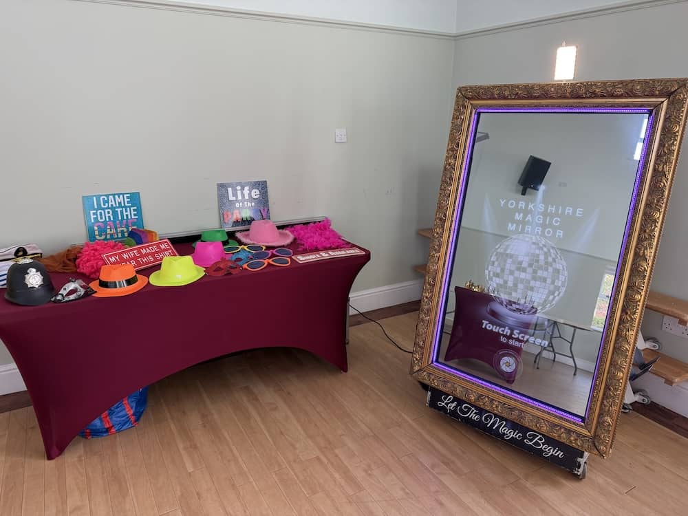 Purple Hollywood-inspired Magic Mirror setup at Meadow View