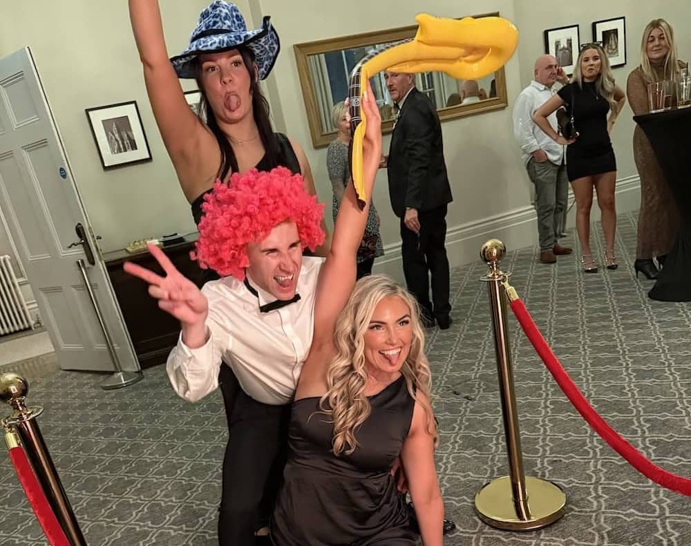 Guests dancing and posing with the Magic Mirror at The Milner York