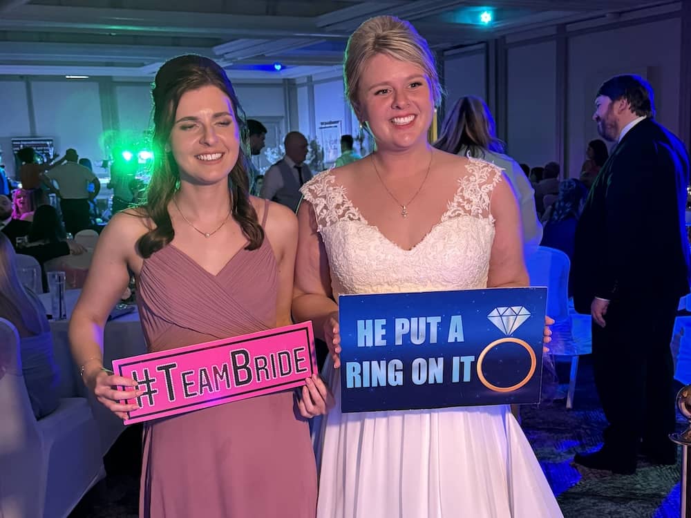 Guests posing with props at Oulton Hall wedding