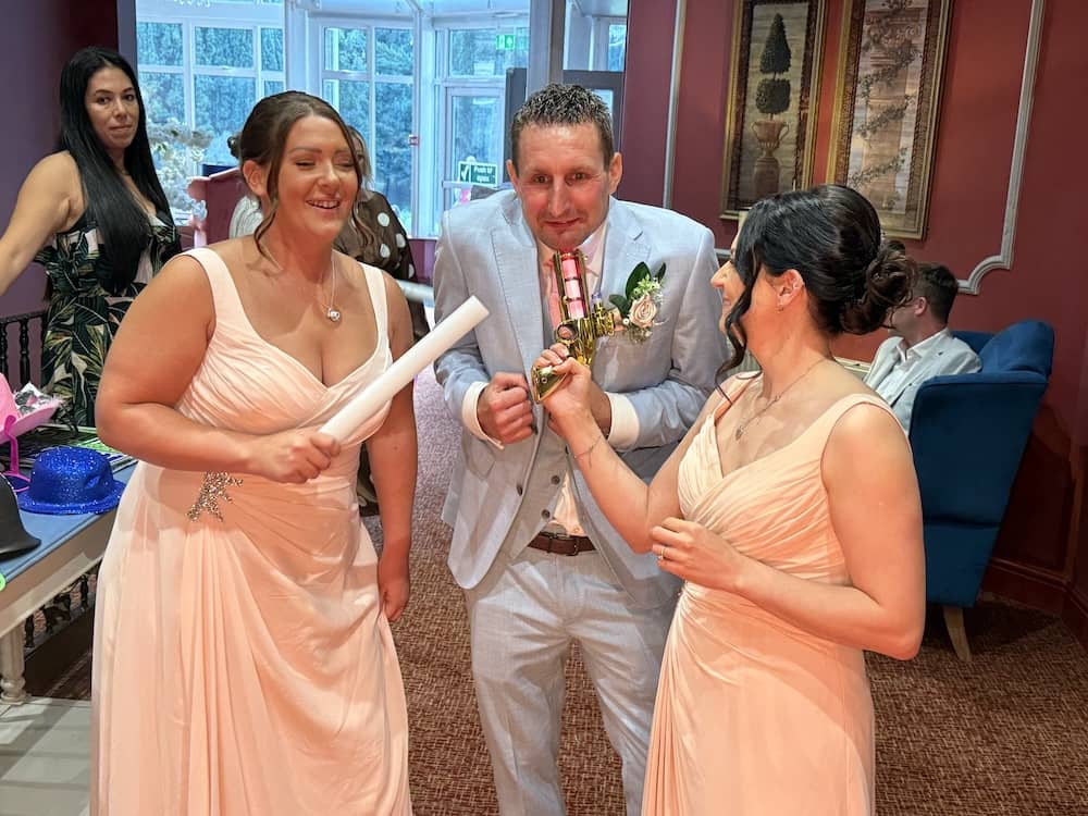 Wedding guests enjoying the Magic Mirror
