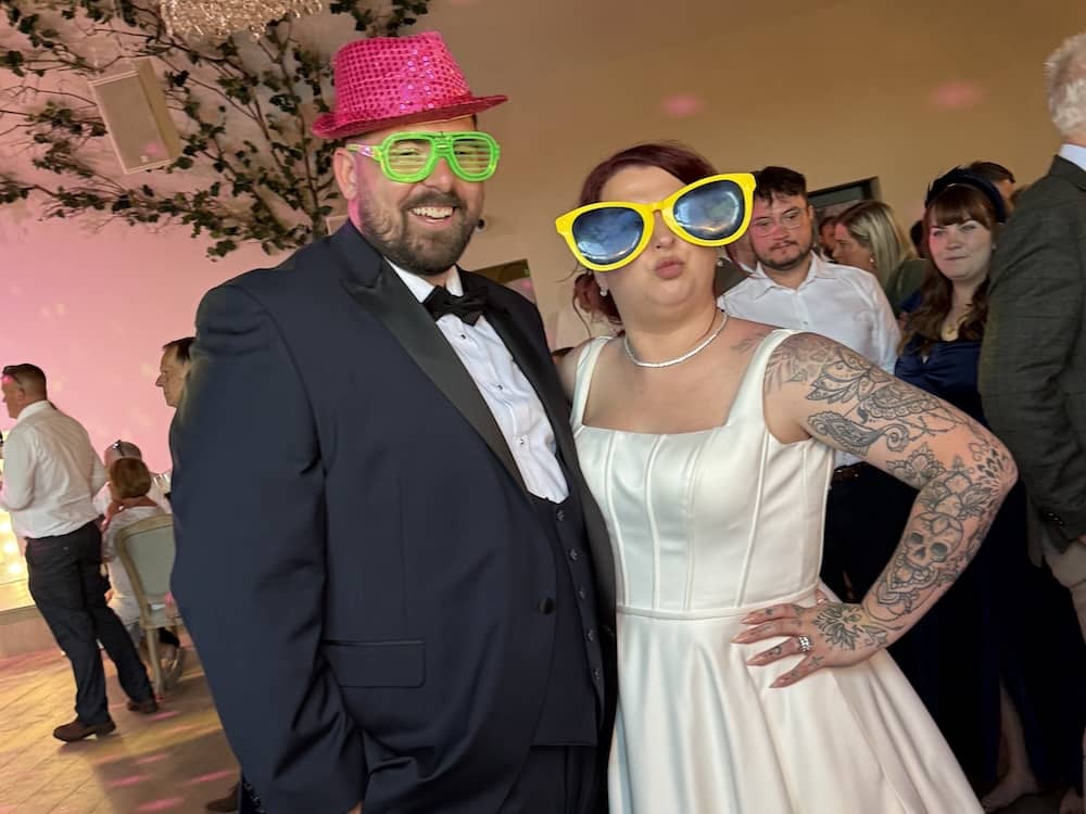 Bride and groom taking an early photograph at the Yorkshire Magic Mirror