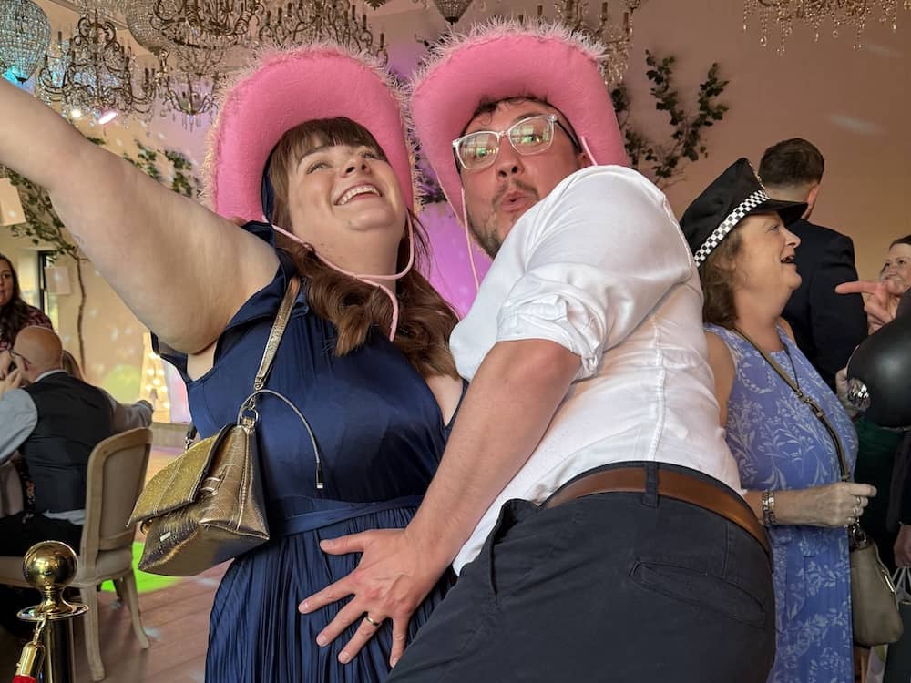 Wedding guests getting the Magic Mirror started