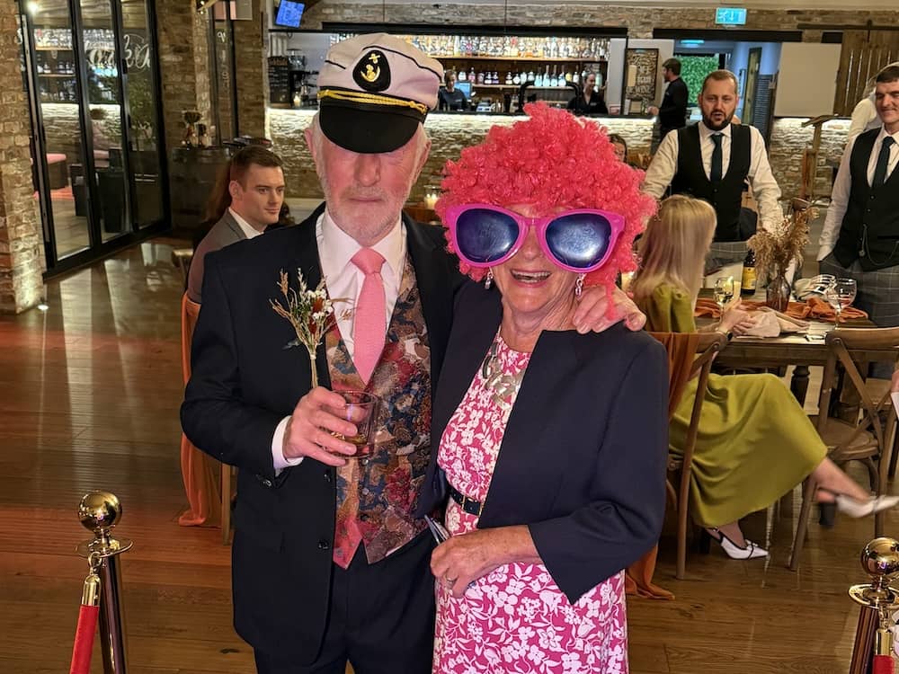 Older wedding guest enjoying the Magic Mirror