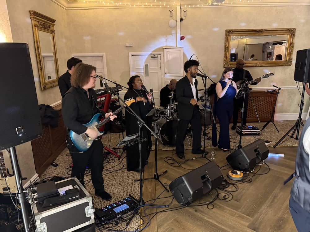 Live band performing during the evening reception at Rogerthorpe Manor Hotel