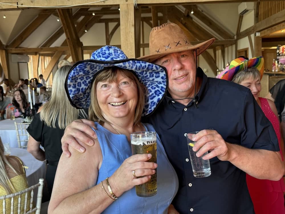 Wedding guests wearing Magic Mirror props at Sandburn Hall