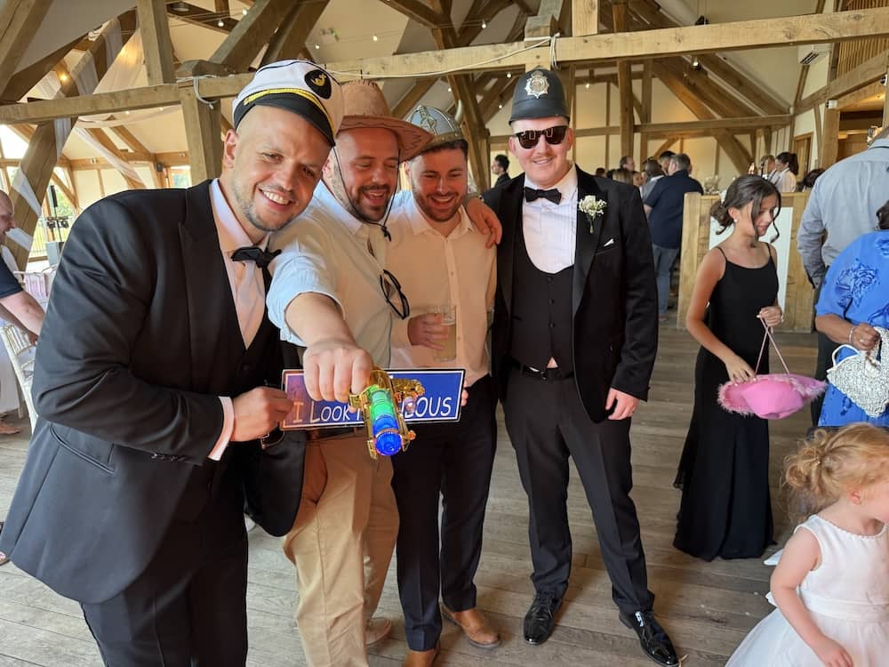 Wedding guests using the Magic Mirror with England flags at Sandburn Hall