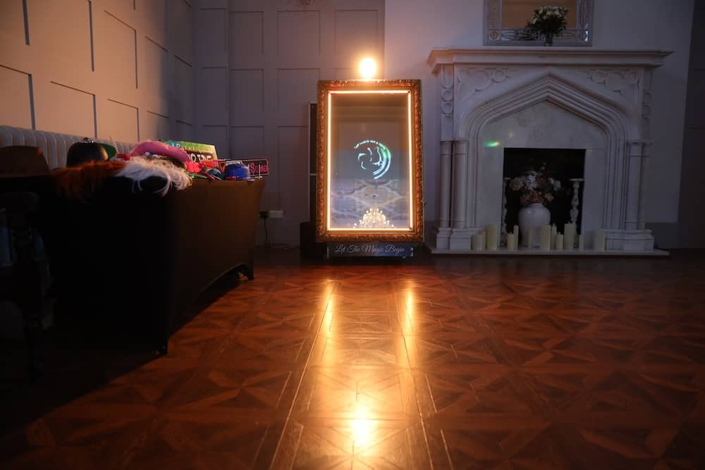 Evening Magic Mirror setup with fireplace at Thicket Priory