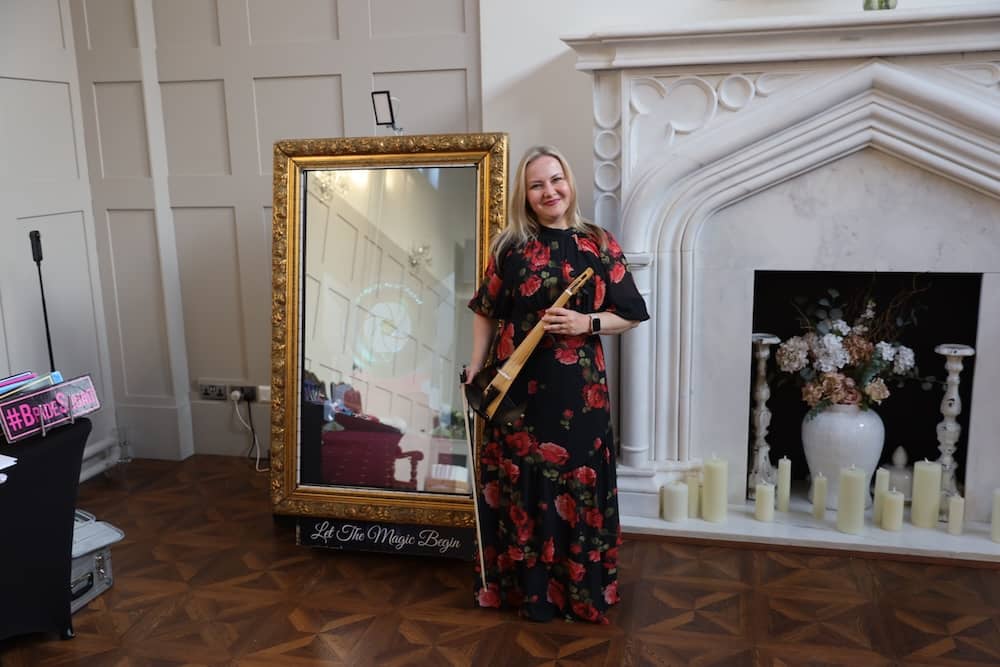 Nadia Violinist performing at Thicket Priory wedding near Magic Mirror