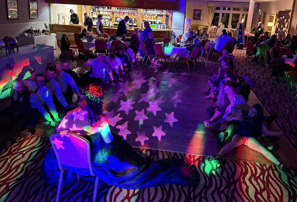 Evening reception party at Bagden Hall Hotel with dancefloor lighting