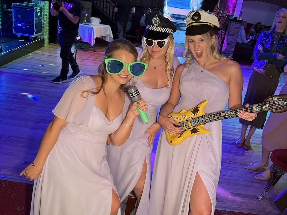 Wedding guests with props at The Engine Shed Wetherby