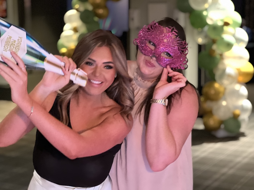 Guests using the Magic Mirror at Village Hotel Leeds South wedding fayre